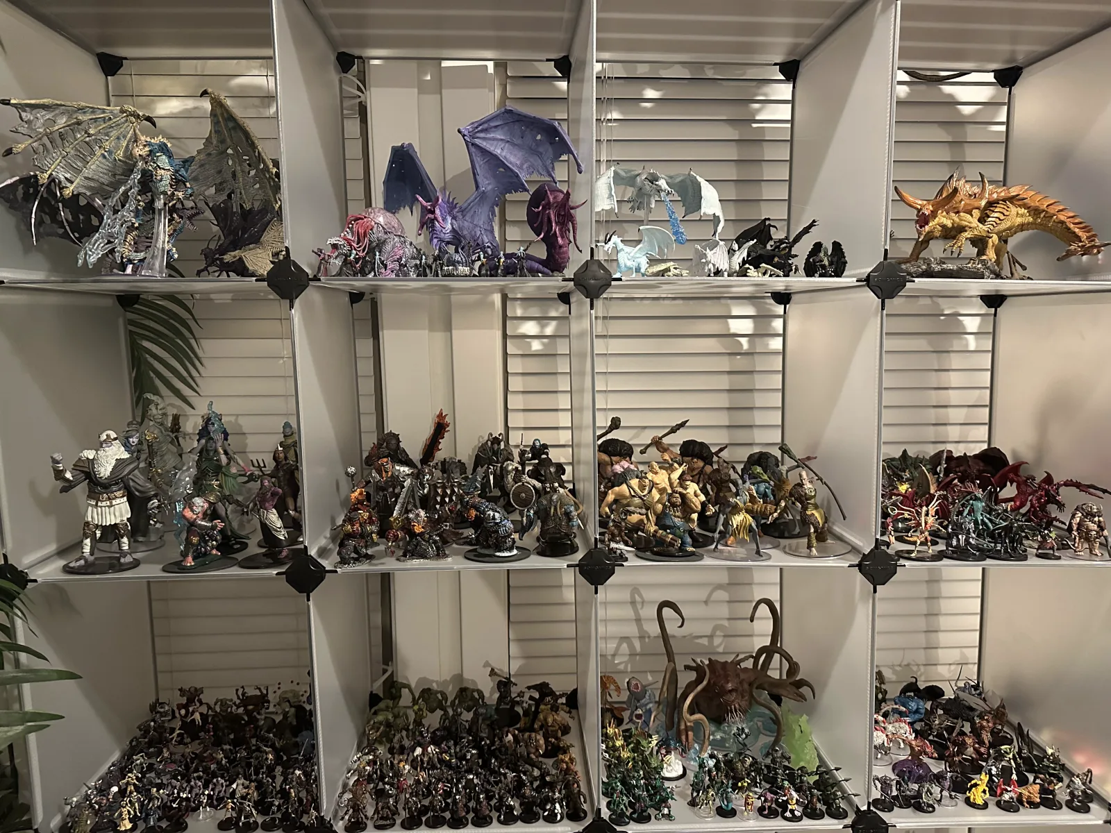 Painted miniatures on a shelf